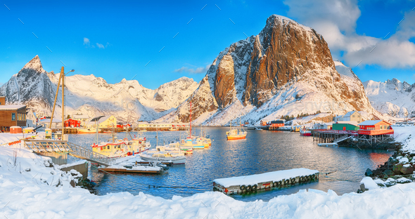 Astonishing winter view on Hamnoy village with port and snowy mountain peaks on background. - Stock Photo - Images