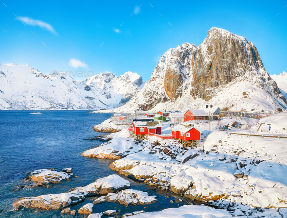 Picturesque winter view on Hamnoy village and Festhaeltinden mountain on background. - Stock Photo - Images