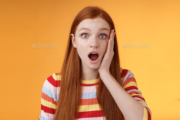 Shocked impressed concerned ginger girl drop jaw gasping stunned slap ...