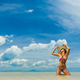 woman sunbathing on the tropical beach - PhotoDune Item for Sale