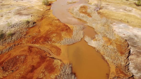 Orange Soil is Contaminated with Heavy Metals From an Industrial Plant