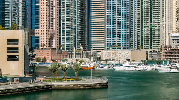 View of Dubai Marina Modern Towers in Dubai at Day Time Timelapse alt