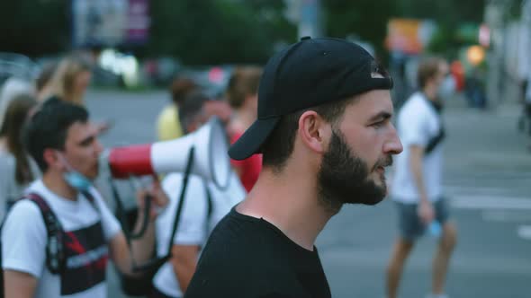 Screaming Angry Protester Activist March with Political Rally Riot Crowd People alt
