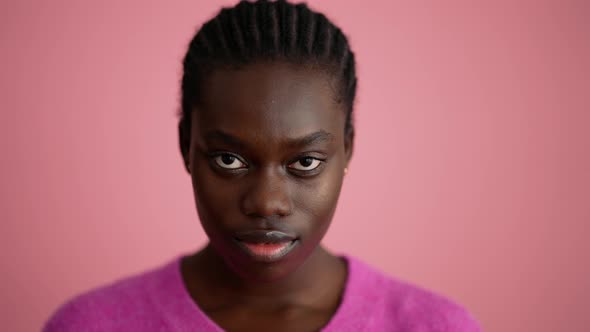 Cheerful woman volunteer looking at the camera alt