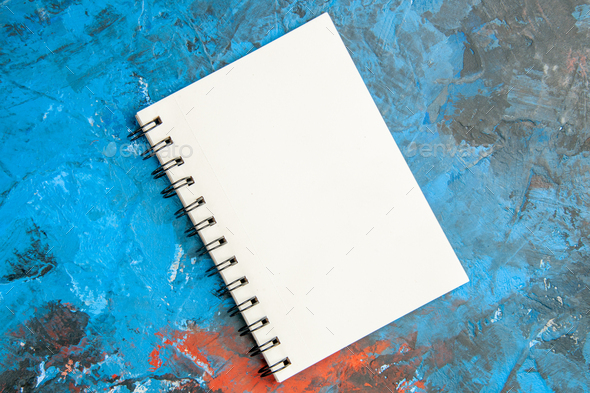 top view empty open notepad on light-blue background color xmas photo  school copybook new year Stock Photo by ImgSolut