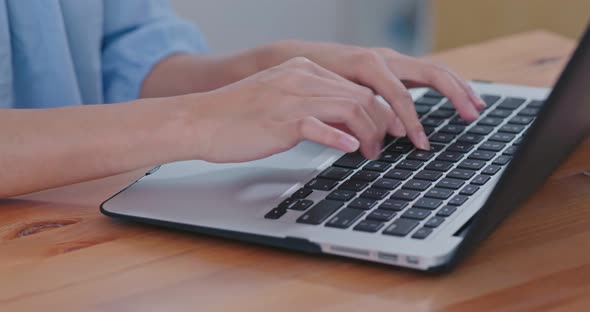 Work on laptop computer at home alt