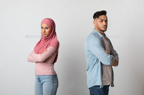 Relationship Crisis. Portrait Of Upset Muslim Couple Ignoring Each Other After Argue