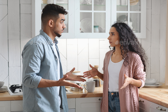 Relationship Crisis. Young Arab Couple Arguing In Kitchen