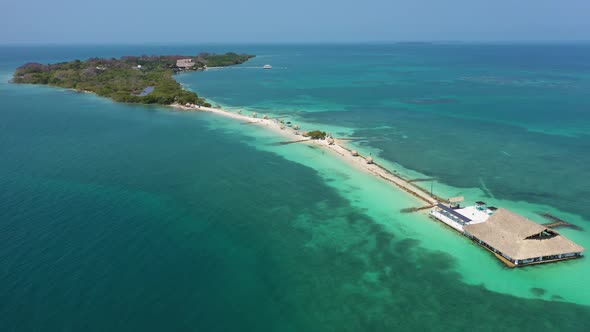 Beautiful Beach with White Sand Turquoise Ocean Blue Sky on a Sunny Day Aerial View alt