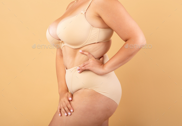 Self Acceptance. Unrecognizable Oversized Woman Wearing Underwear Posing  Over Beige Background Stock Photo by Prostock-studio