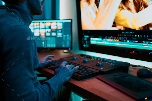 Male Video Editor Working on His Personal Computer with Big Display ...