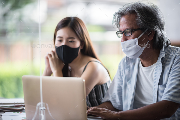 Social distance office and protecting health of workers. business person in protective masks