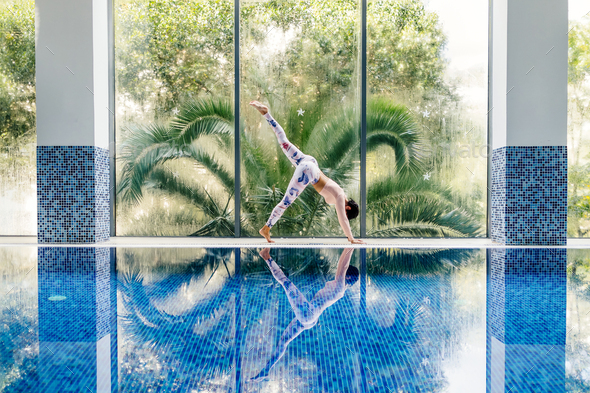 beautiful sporty woman yoga asana practice morning routine - Stock Photo - Images