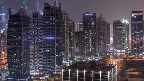 Residential and Office Buildings in Jumeirah Lake Towers District Night Timelapse in Dubai alt