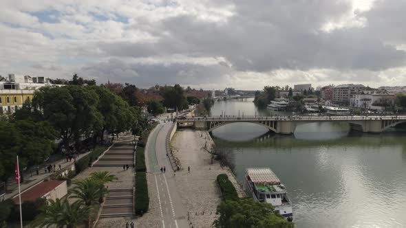 Torre del Oro (Tower of Gold) military watchtower on Guadalquivir river; drone