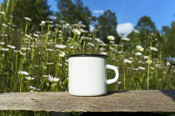 Download Placeit White Campfire Enamel Mug Mockup With Daisy Field Stock Photo By Tasipas