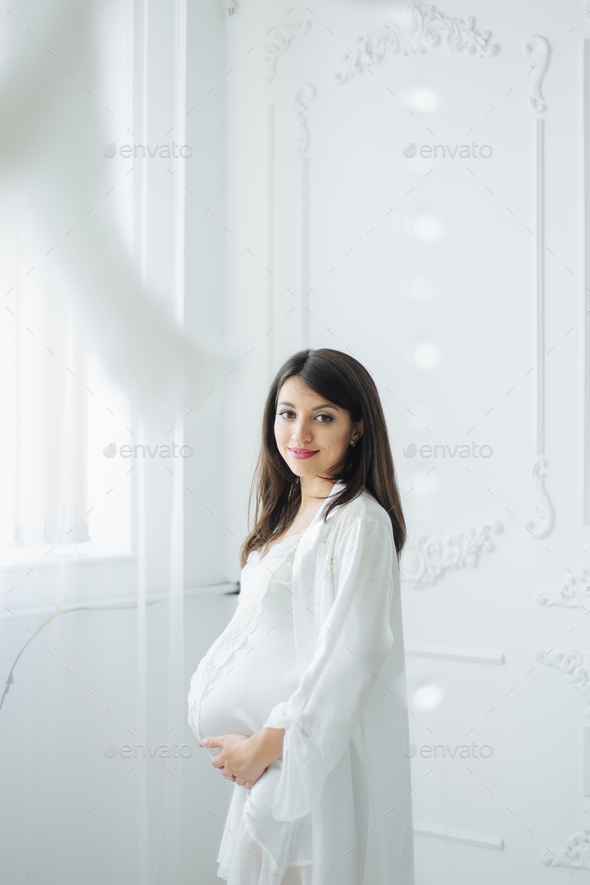 Pregnant woman portrait isolated on white. Flat - Stock