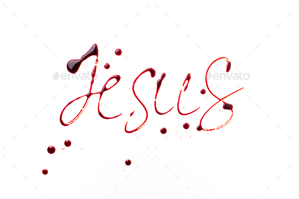 Name Jesus written with blood isolated on white background. Top view. Palm Sunday, Good Friday