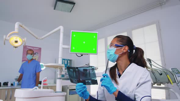 Dentist Doctor Showing Unit Monitor with Mockup Screen Pov Patient alt