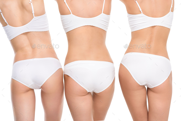 back view of women in underwear posing isolated on white Stock