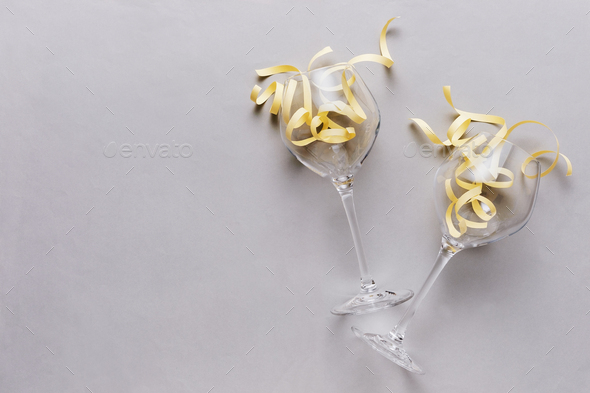 Yellow ribbons in glasses on gray background - Stock Photo - Images