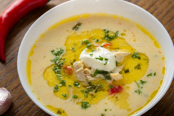 Ciorba Radauteana - Romanian traditional chicken soup - Stock Photo - Images
