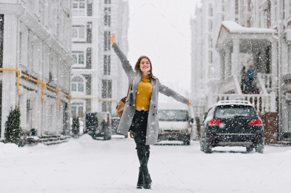 A Teenage Girl Poses In A Winter Forest She Has A Handful Of Snow And She  Blows On The Snow Stock Photo - Download Image Now - iStock