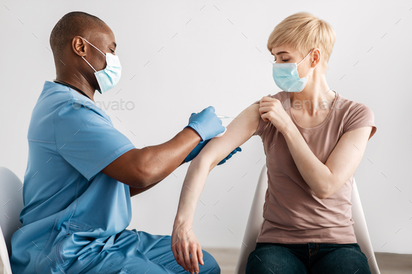 Immunization at coronavirus, flu, pneumonia at hospital during visit to doctor