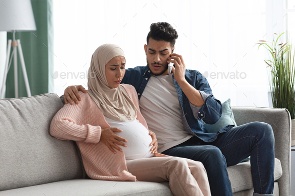Pregnant Muslim Woman Suffering Labor Pain At Home, Her Husband Calling Doctor