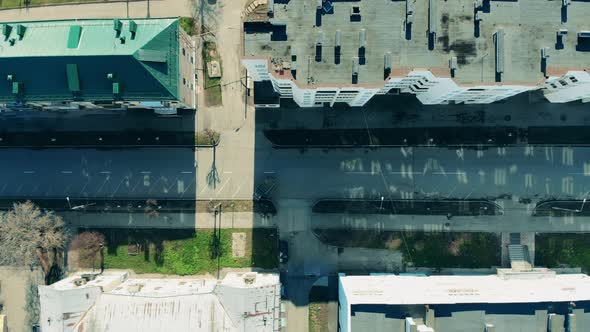 View From Above of City Streets and Empty Driveways alt