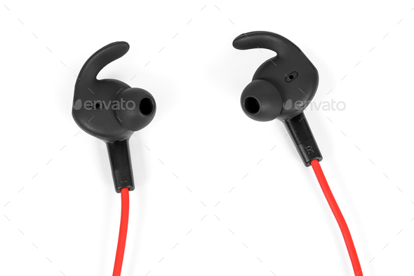 Closeup of modern earphones on white background
