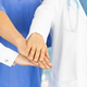 physicians stacks their hands together - PhotoDune Item for Sale