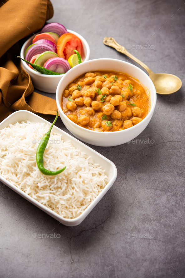chole, Chickpea curry or chana masala with plain rice, Popular North ...