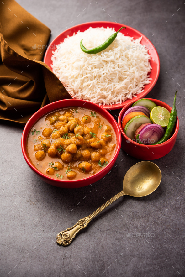 chole, Chickpea curry or chana masala with plain rice, Popular North ...
