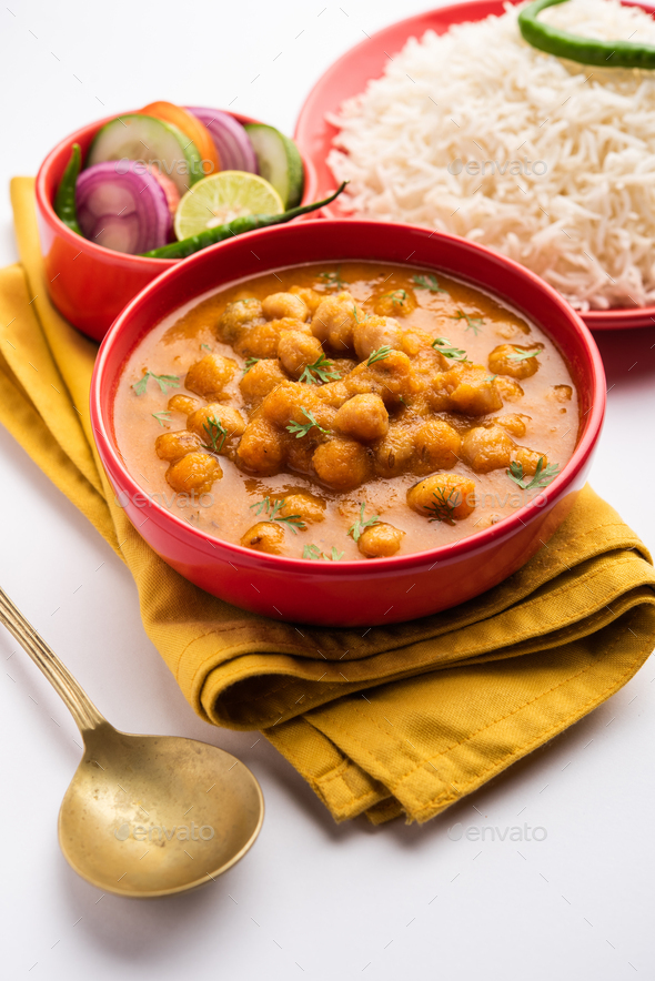 chole, Chickpea curry or chana masala with plain rice, Popular North ...