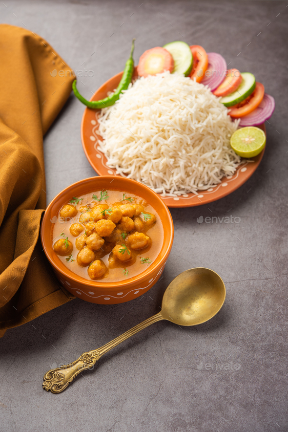 chole, Chickpea curry or chana masala with plain rice, Popular North ...