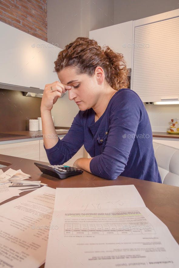 Unemployed woman with debts review monthly bills