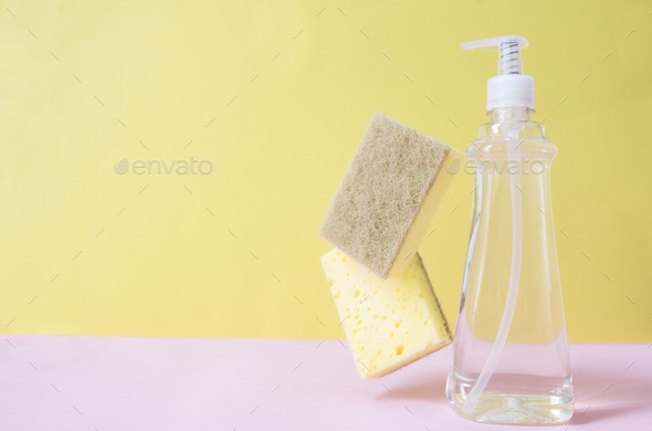 Soap dropper, dishwashing liquid, dish soap, washcloth. Pink, yellow background