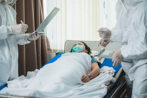 Doctors and patients person wearing surgical face masks in hospital ...