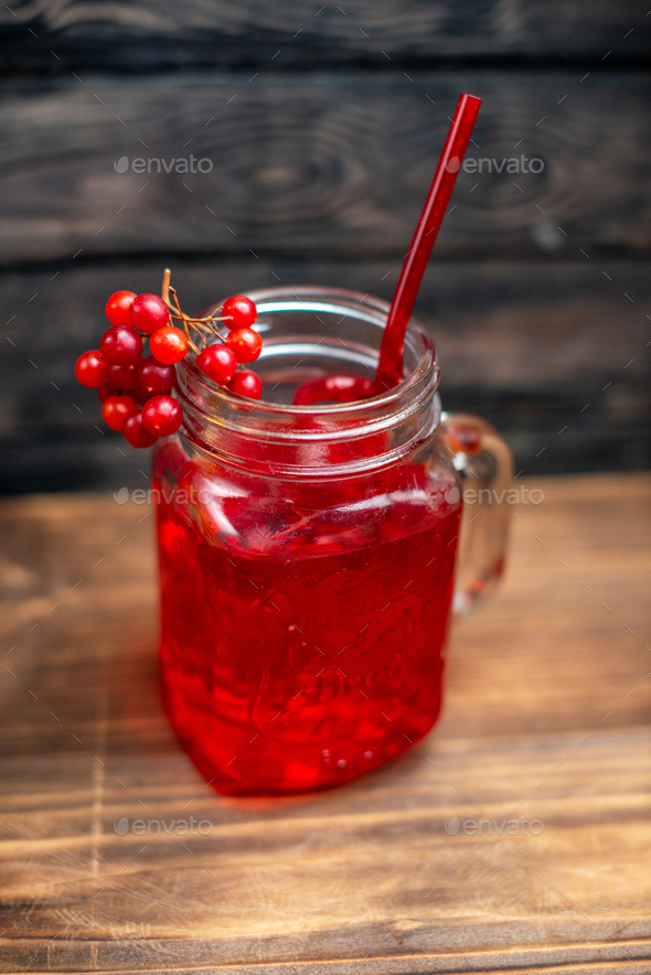 front view fresh cranberry juice inside can on brown wooden desk drink photo cocktail color fruit