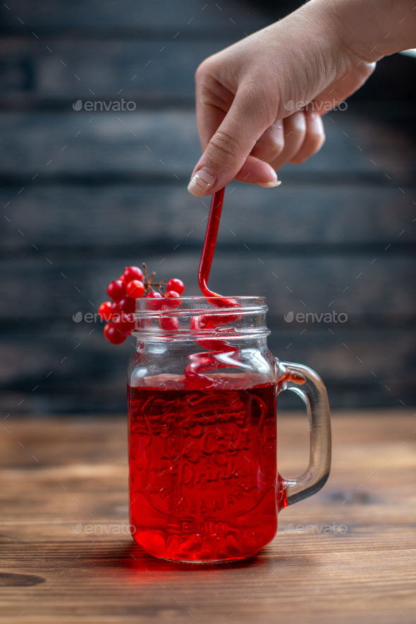 front view fresh cranberry juice inside can with straw on the dark background bar fruit photo