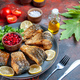 Front view (fried fish)  on the turqoise plate with lemon slices pomegranate seeds and greens  was p - PhotoDune Item for Sale