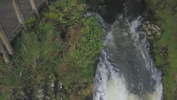 Flying above waterfall