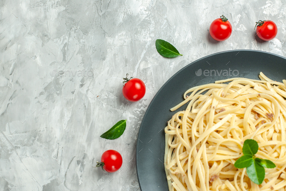 top view tasty italian pasta with cutlery on light background color ...