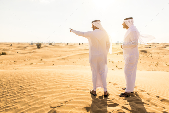 Two Arab Men Travelling in the Desert Traditional Clothing and