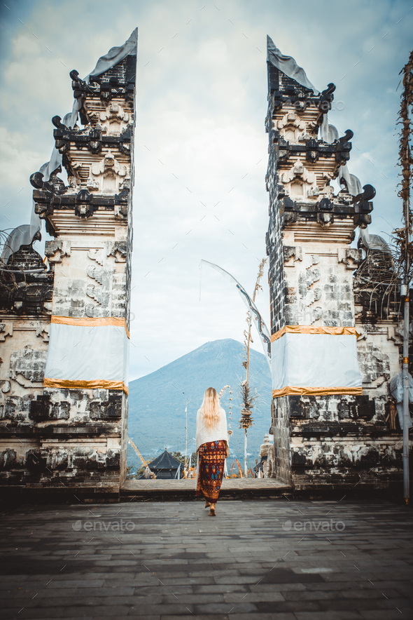 Woman at Pura Lempuyang temple in Bali - Stock Photo - Images