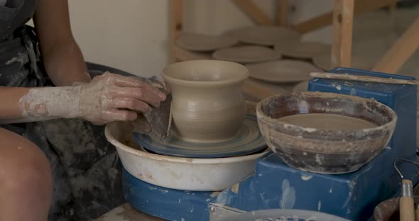 Close Up of Pottery Artist at Work Potter Master Creating Clay Pot on a Wheel