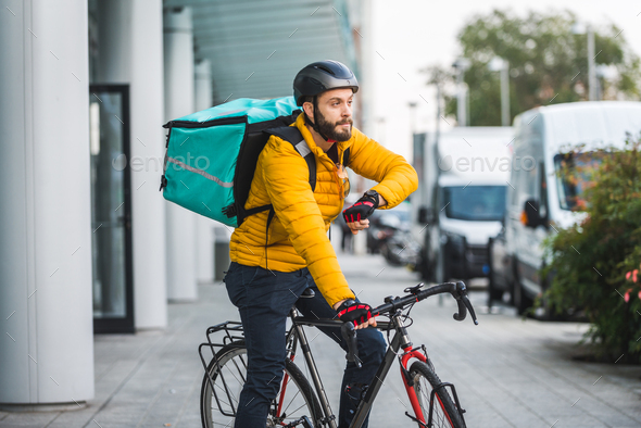 Food delivery, rider with bicycle delivering food
