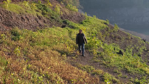Walking Path Young Man Walking the Path By the Lake alt