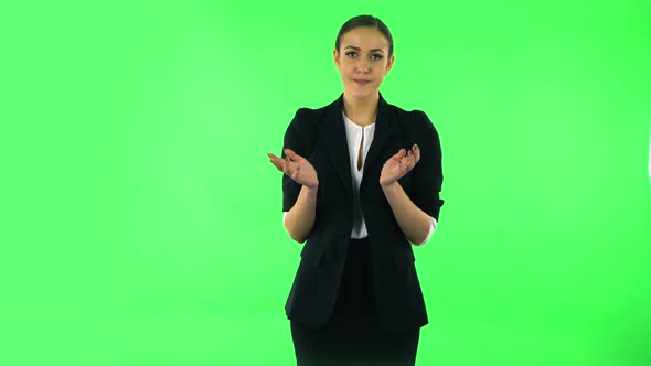 Upset Girl Looking at the Camera with Tears in Her Eyes. Green Screen alt